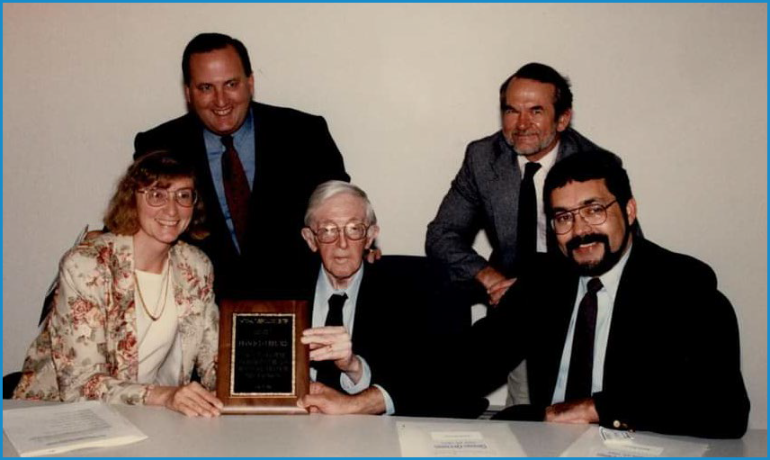 Grand opening of the Curry Center, June 1994. Seated [l to r]: Gisela Schecter, Francis J. Curry, Kenneth Castro. Standing [l to r]: George Rutherford, Phil Hopewell. [Photo: CITC archive]